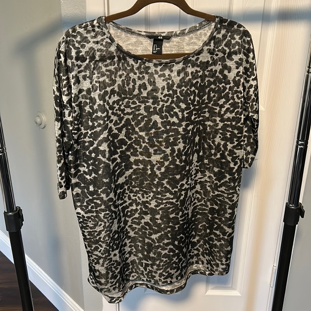 Oversized, semi-sheer snow-leopard print top.